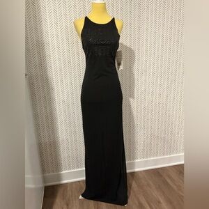 Full length gown with glitter pattern and high slit